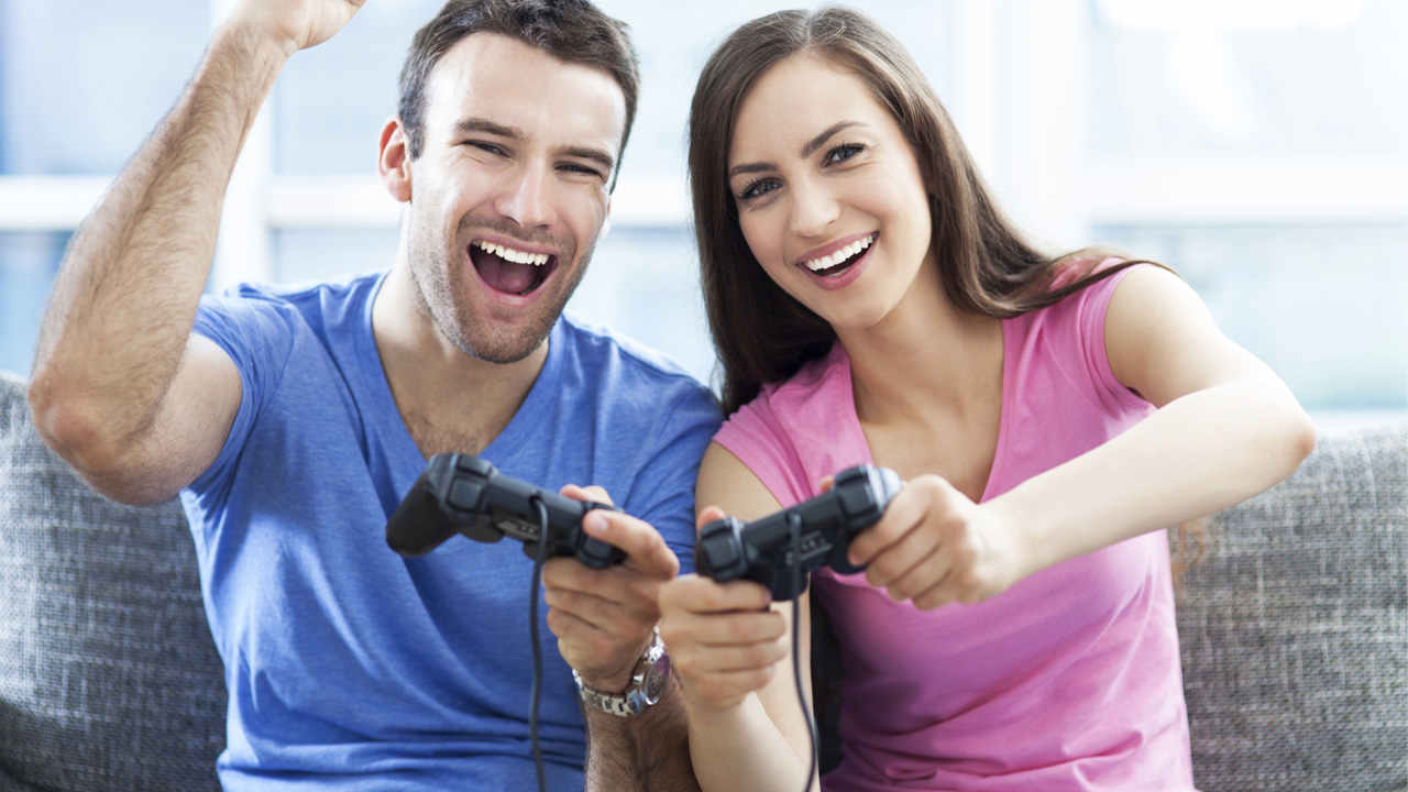Fun Couple Playing Video Games